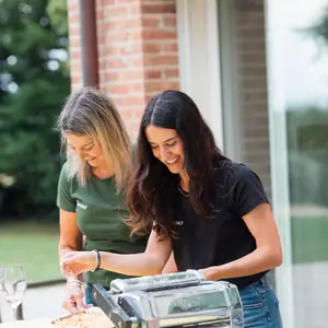 Susanna Fongaro making fresh pasta at a table