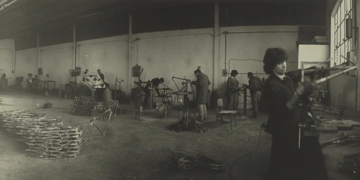 Frame builders at work in an early Basso workshop, from the Basso archive