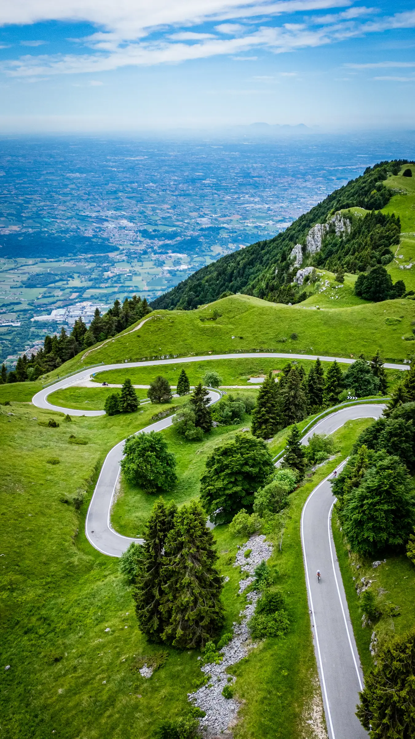 Hairpins on the road up Monte Grappa, looking out over Veneto