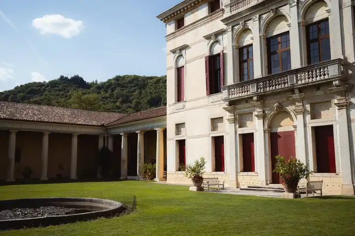The front and lawn of a Palladian villa