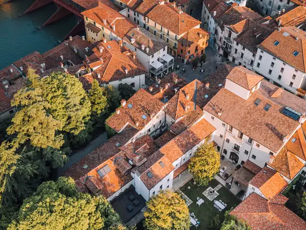 Bassano's rooftops and the River Brenta from above